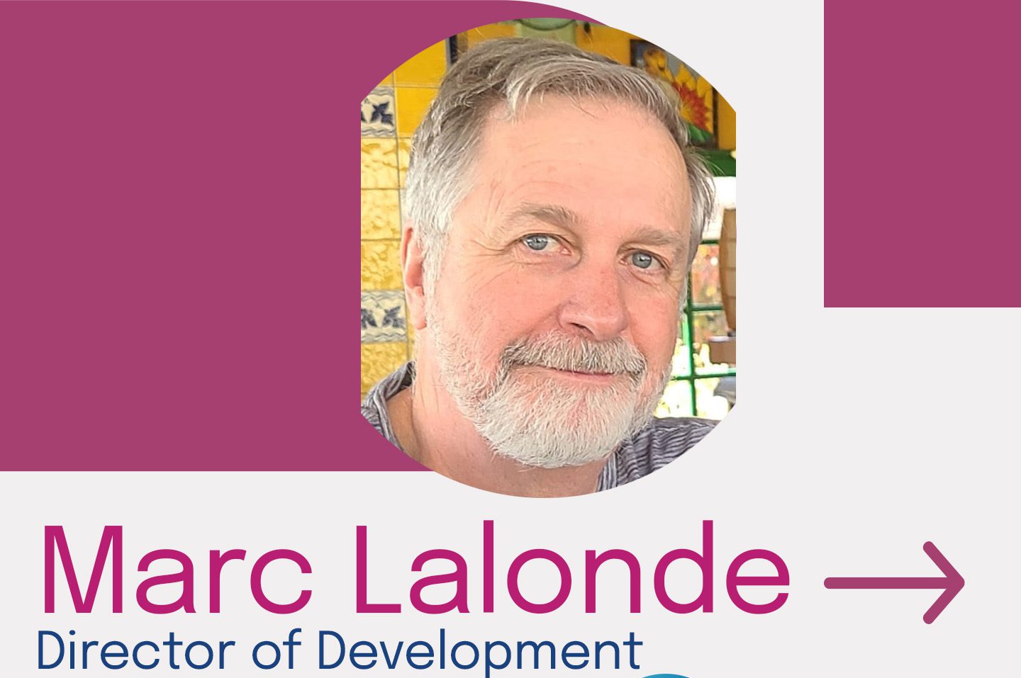 Man smiling with text about development director.